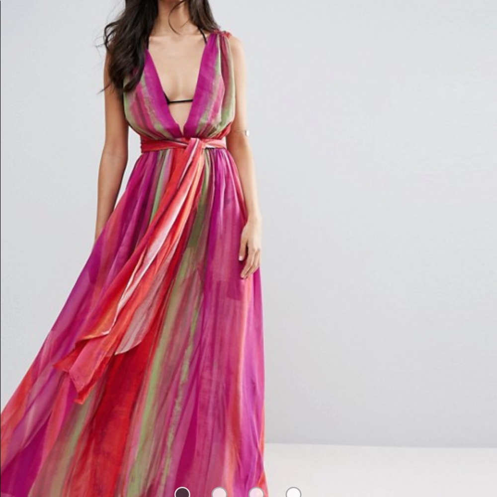 Absolutely gorgeous dress! Brand new. Colorful and fun.